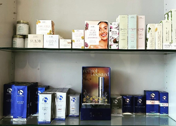 Picture of a shelf of skincare products at Salon Essential